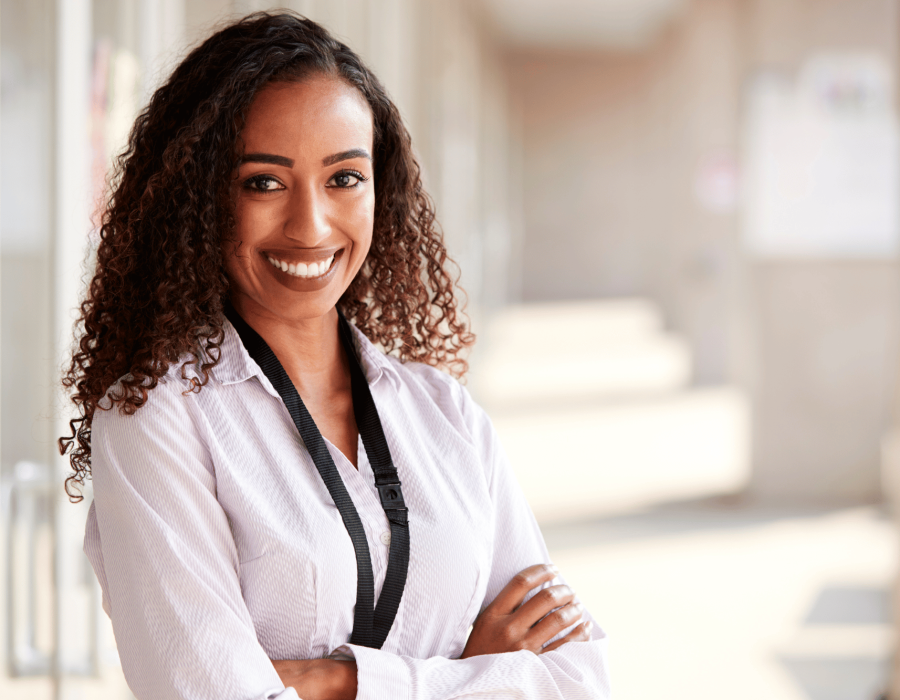 smiling expatriate professional in an international workplace environment